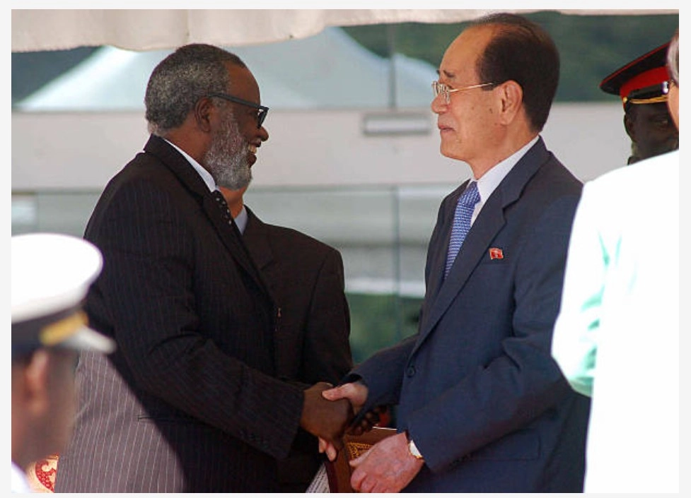 First President Sam Nujoma shaking hands with the president of the Presidium of the Supreme People's Assembly Kim Yong Nam 21 March 2008