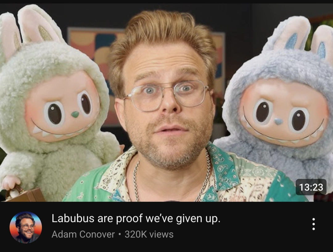 screenshot of adam conover video thumbnail, titled "labubus are proof we've given up"